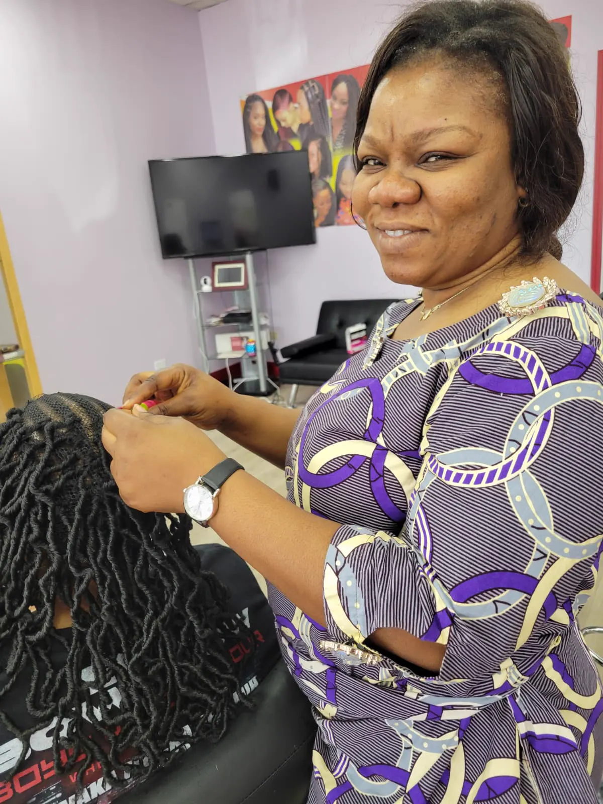 Braided style by Jacquie African Hair Braiding